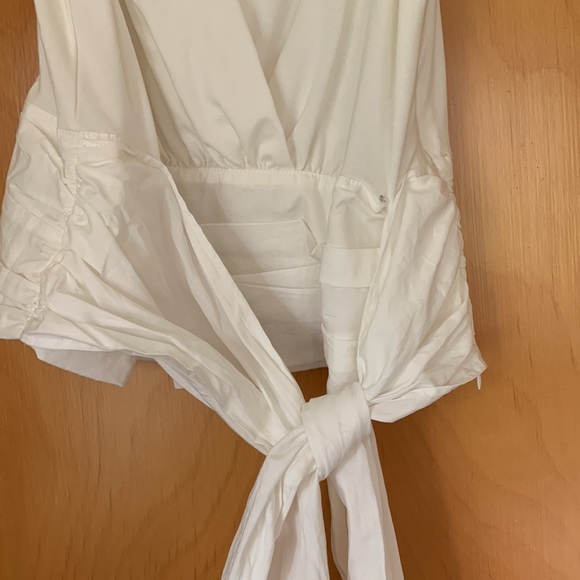 Brand new with tags Anthropologie wrap blouse. - Picture 7 of 9